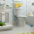 Two-Piece Right Height Elongated 1.28GPF Toilet with Right Hand Trip Lever with 12-in Rough-In