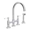 Deck Mount C-Spout 3 Leg Bridge Kitchen Faucet With Sidespray And Porcelain Lever In Polished Chrome