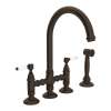 Deck Mount C-Spout 3 Leg Bridge Kitchen Faucet With Sidespray And Porcelain Lever In Tuscan Brass