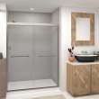Semi-frameless bypass shower door featuring EXCLUSIVE TruMotion technology with smooth clear glass texture and modern Sabrina handles 57-3/4-in to 59-in W x 76-in H